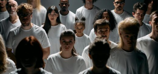 photo of people wearing white crew neck shirt